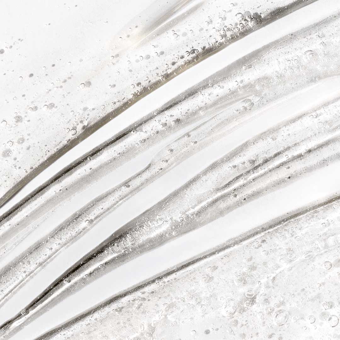 Special Cleansing Gel ist ein seifenfreies Reinigungsgel mit Bläschen und Schlieren auf einer weißen Oberfläche, das den natürlichen Feuchtigkeitshaushalt der Haut bewahrt.