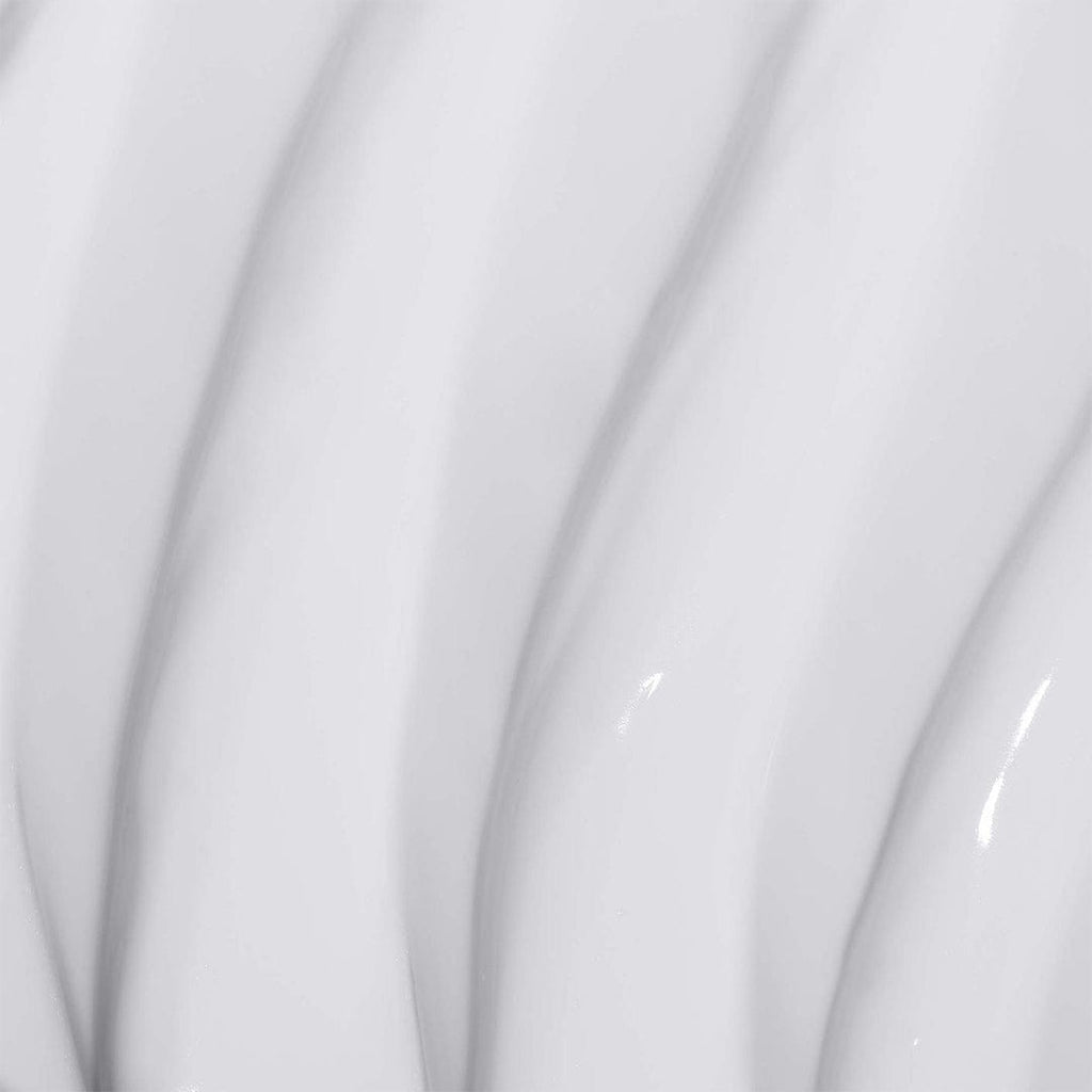 Nahaufnahme einer glatten, weißen, spiralförmigen Oberfläche mit weichen Schatten und glänzenden Highlights, die an Super Rich Repair erinnert – eine luxuriöse Feuchtigkeitscreme.